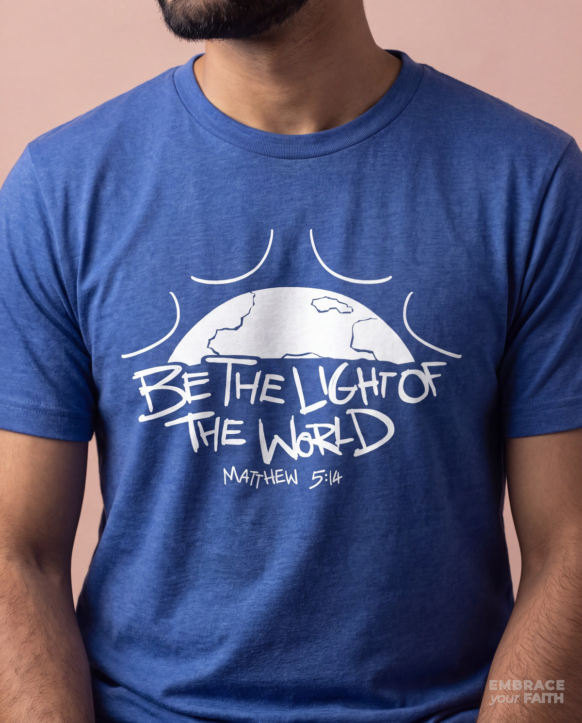 Close-up of the Be the Light of the World T-Shirt print in Heather True Royal
