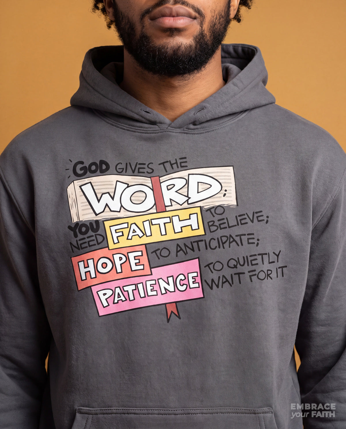 Close-up of the print on the God Gives the Word Unisex Hoodie (Premium) in Carbon Grey