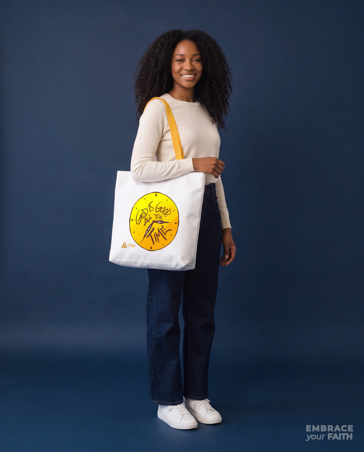 EYF model carrying the God Is Good All the Time Tote Bag with Yellow straps