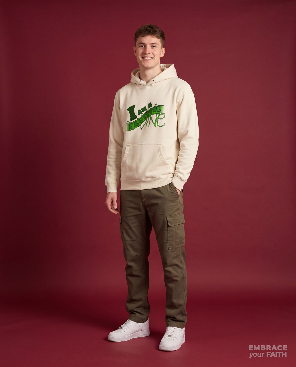 EYF model wearing the I Am a Fruitful Vine Classic Unisex Hoodie in Bone