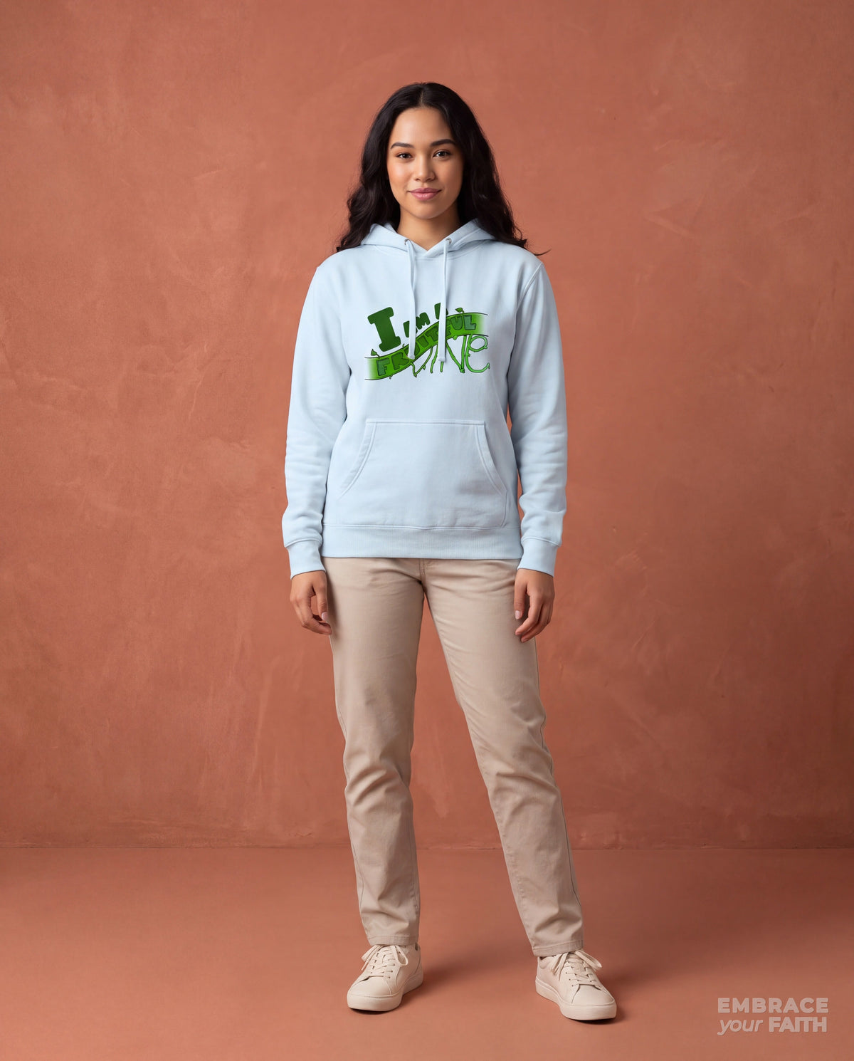 EYF model wearing the I Am a Fruitful Vine Classic Unisex Hoodie in Sky Blue